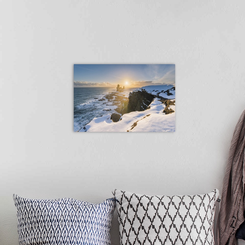 A bohemian room featuring Snaefellsnes Peninsula, Western Iceland, Iceland. Londrangar sea stack and coastal cliffs at sunset.