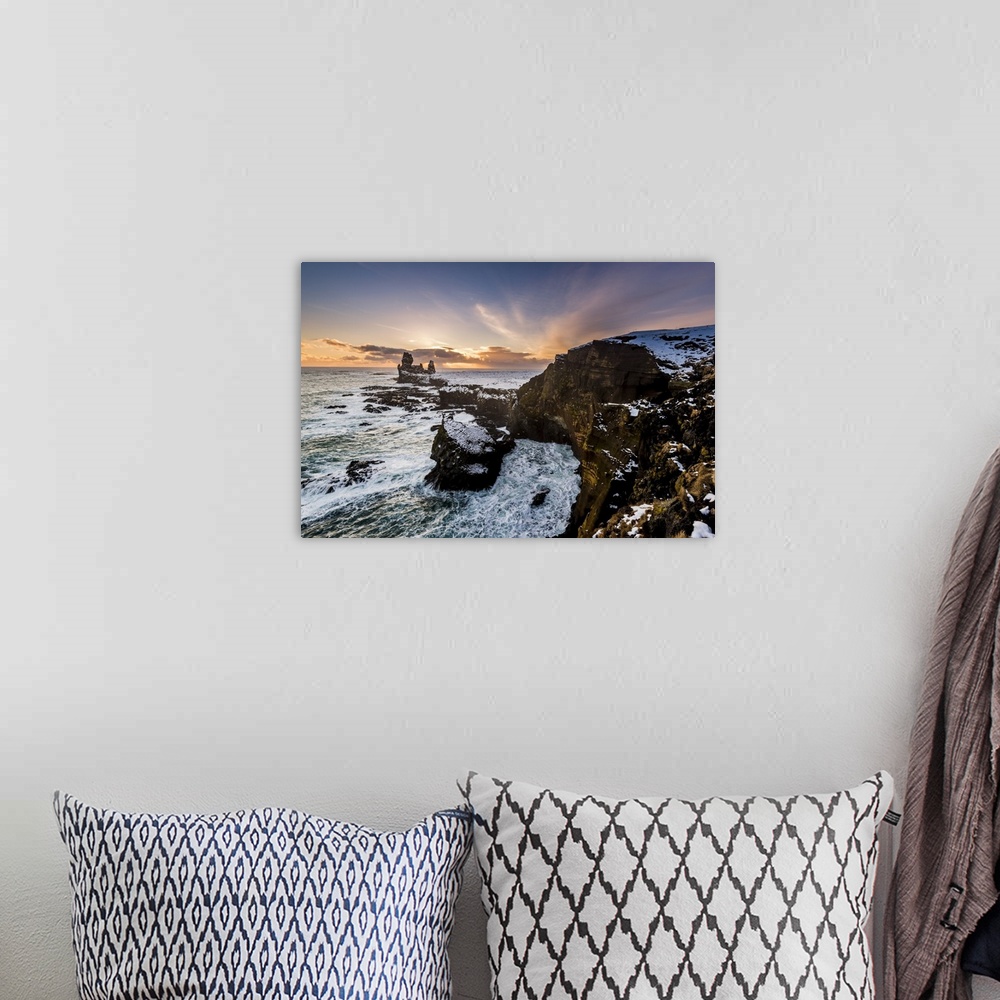 A bohemian room featuring Snaefellsnes Peninsula, Western Iceland, Iceland. Londrangar sea stack and coastal cliffs at sunset.