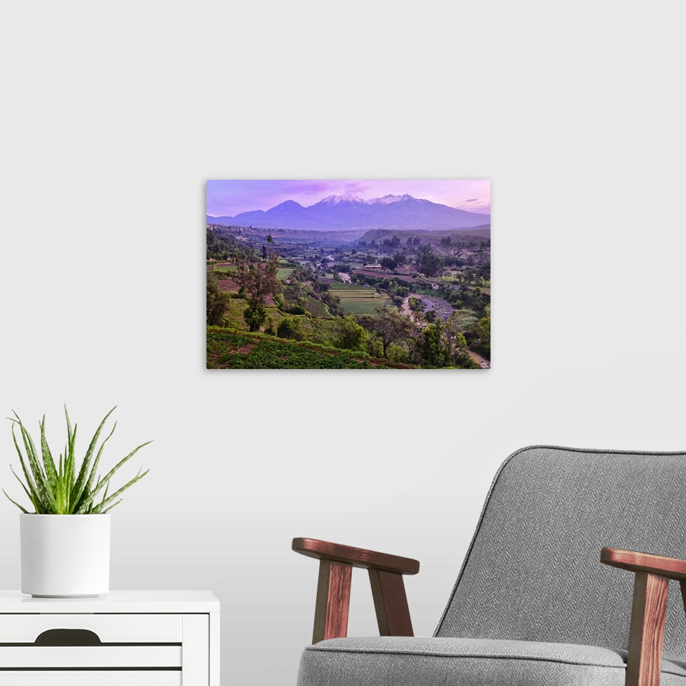 A modern room featuring South America, Peru, Arequipa, andes mountains at dawn.