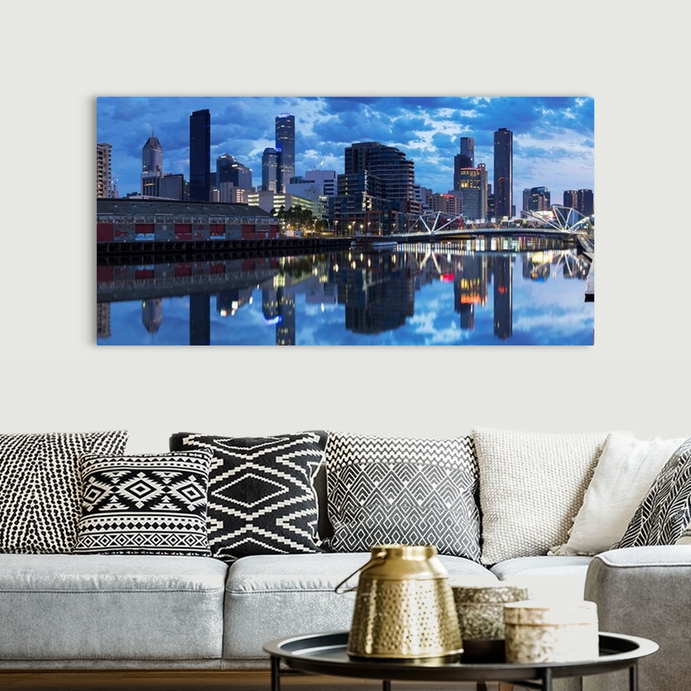 A bohemian room featuring South Wharf skyline at dawn, Melbourne, Victoria, Australia.