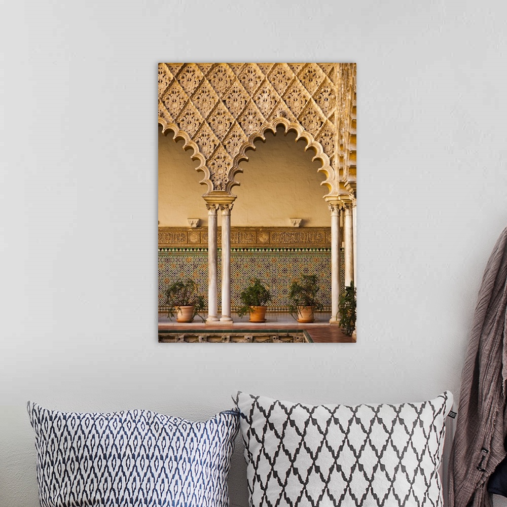 A bohemian room featuring Spain, Andalucia Region, Seville Province, Seville, The Alcazar, Moorish arches