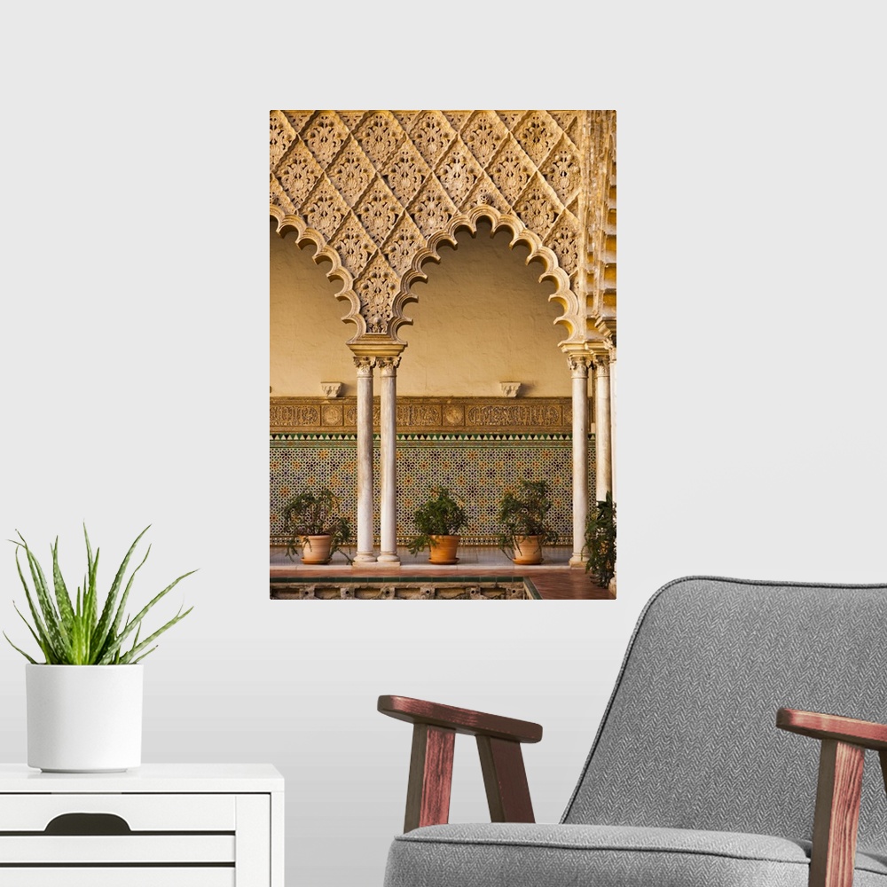 A modern room featuring Spain, Andalucia Region, Seville Province, Seville, The Alcazar, Moorish arches