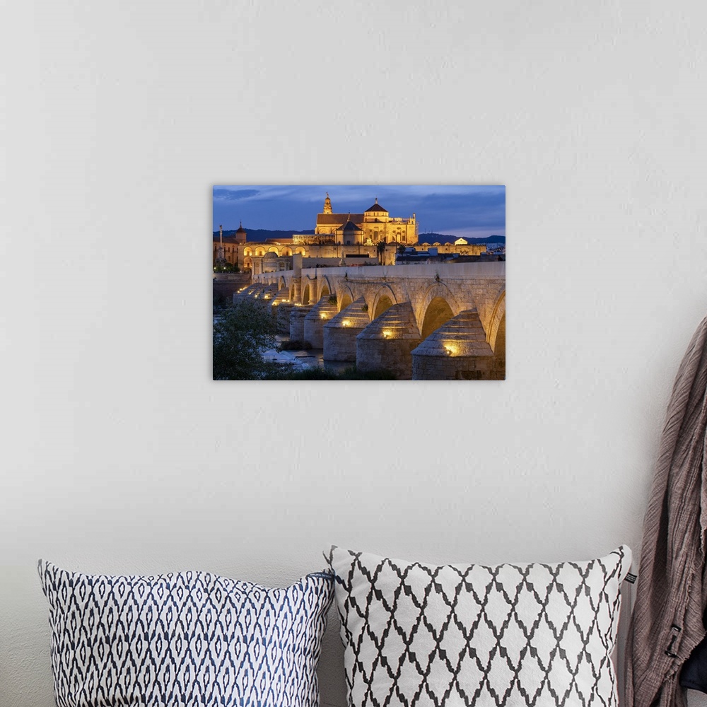 A bohemian room featuring Spain, Andalusia, Cordoba, Roman Bridge over Guadalquivir river,.