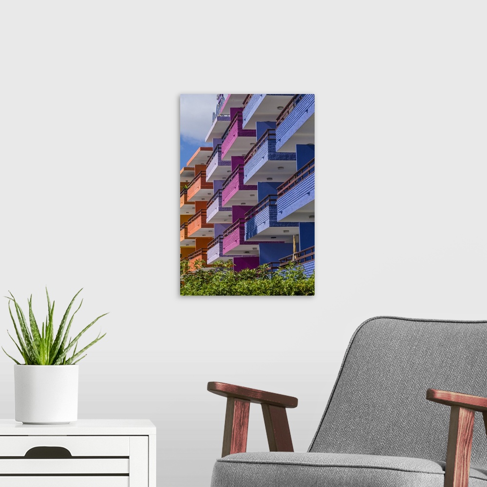 A modern room featuring Spain, Canary Islands, Gran Canaria Island, Playa del Ingles, colorful balconies.