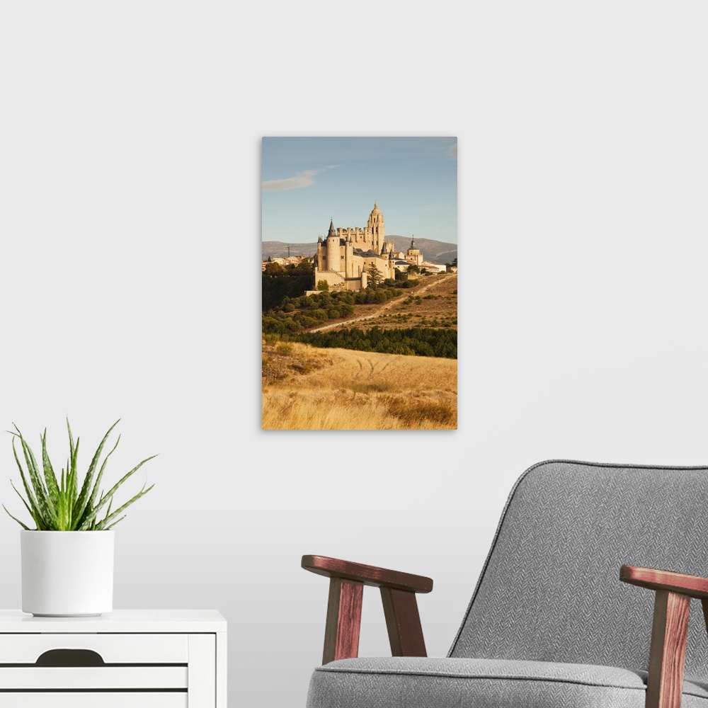 A modern room featuring Spain, Castilla y Leon Region, Segovia Province, Segovia, elevated town view with Segovia Cathedr...