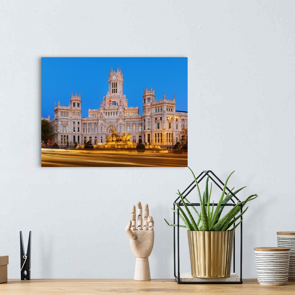 A bohemian room featuring Spain, Madrid. Plaza de Cibeles and town hall at dusk.