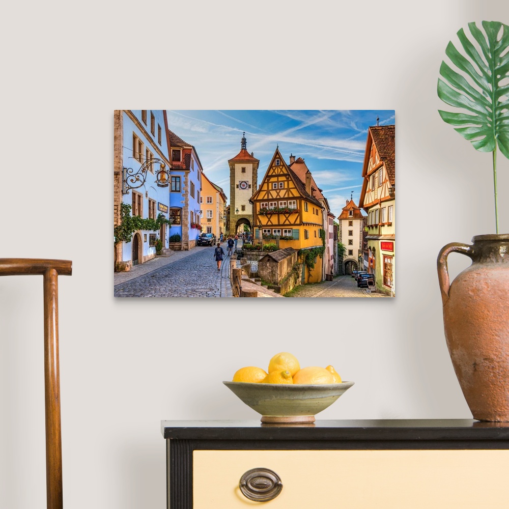 A traditional room featuring Spitalgasse street with Plonlein half-timbered building in the middle and Siebers Tower on the le...