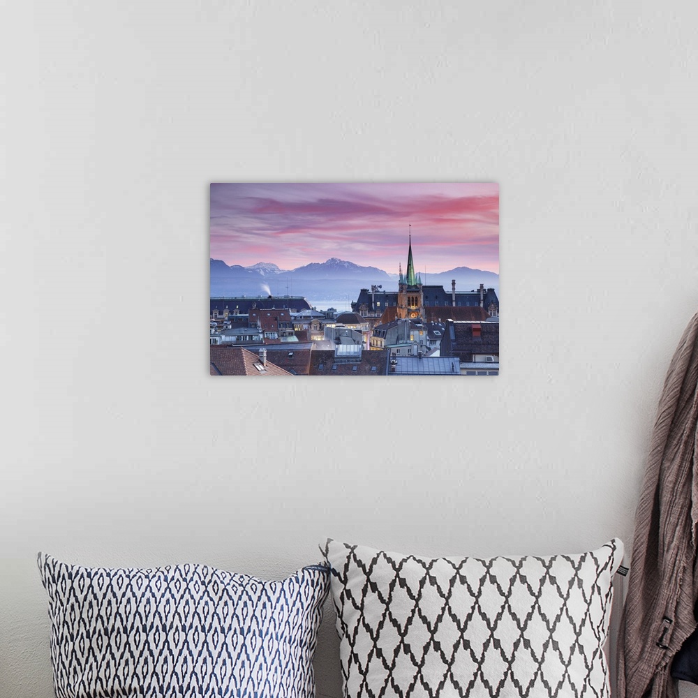 A bohemian room featuring St Francois Church and city skyline at sunset, Lausanne, Vaud, Switzerland