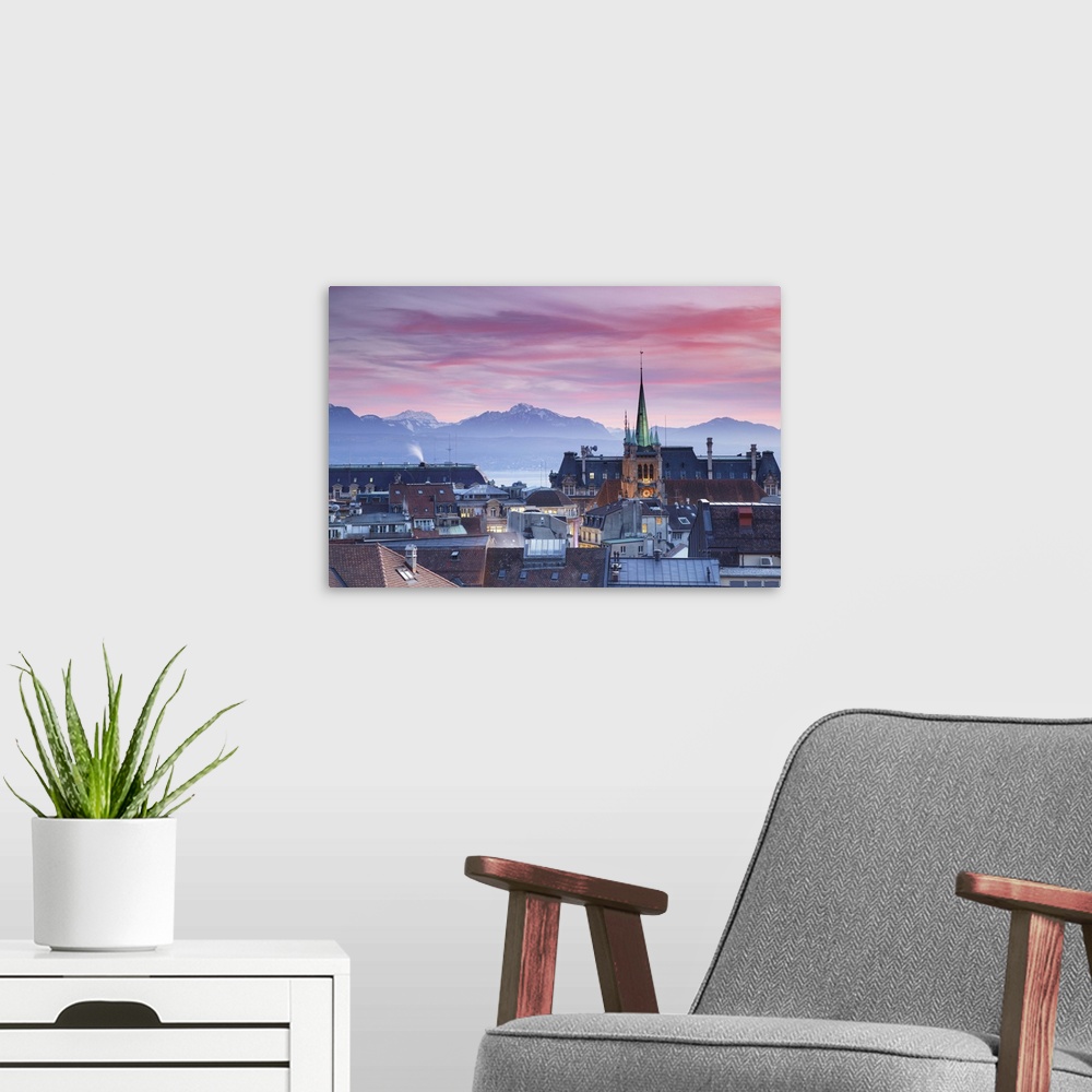 A modern room featuring St Francois Church and city skyline at sunset, Lausanne, Vaud, Switzerland