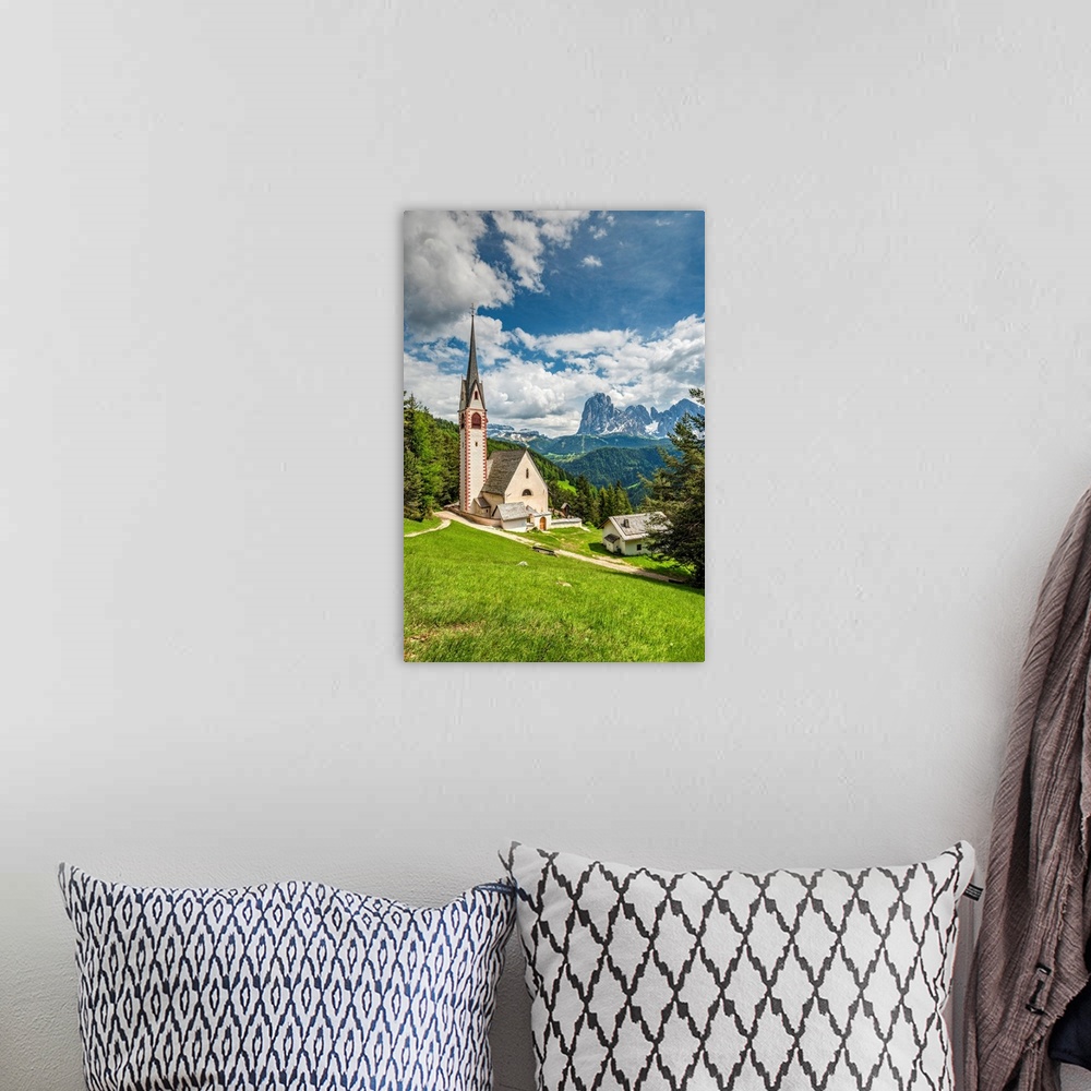 A bohemian room featuring St. Jakob Church With Langkofel - Sassolungo Mountain Group In The Background, Ortisei - St. Ulri...