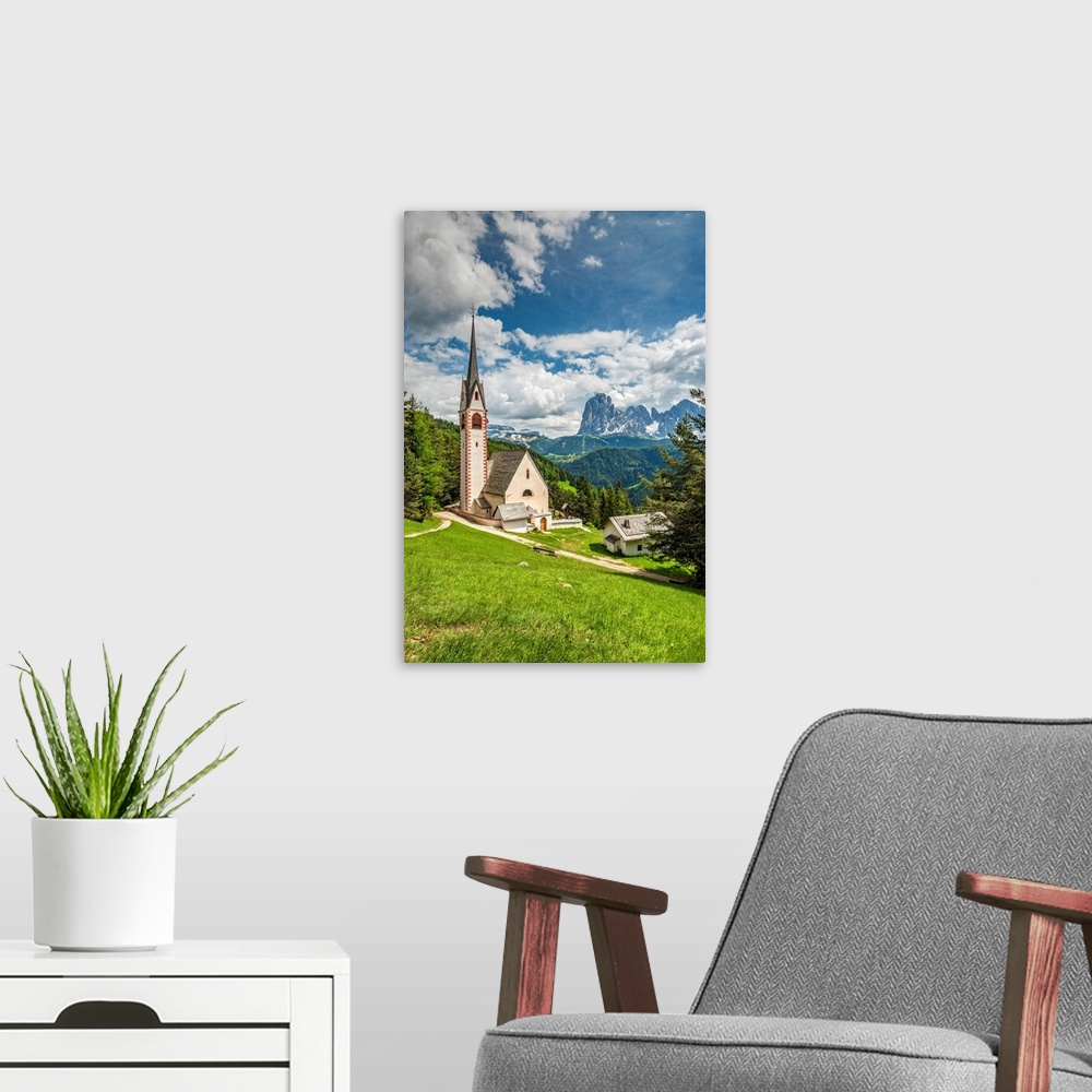 A modern room featuring St. Jakob Church With Langkofel - Sassolungo Mountain Group In The Background, Ortisei - St. Ulri...