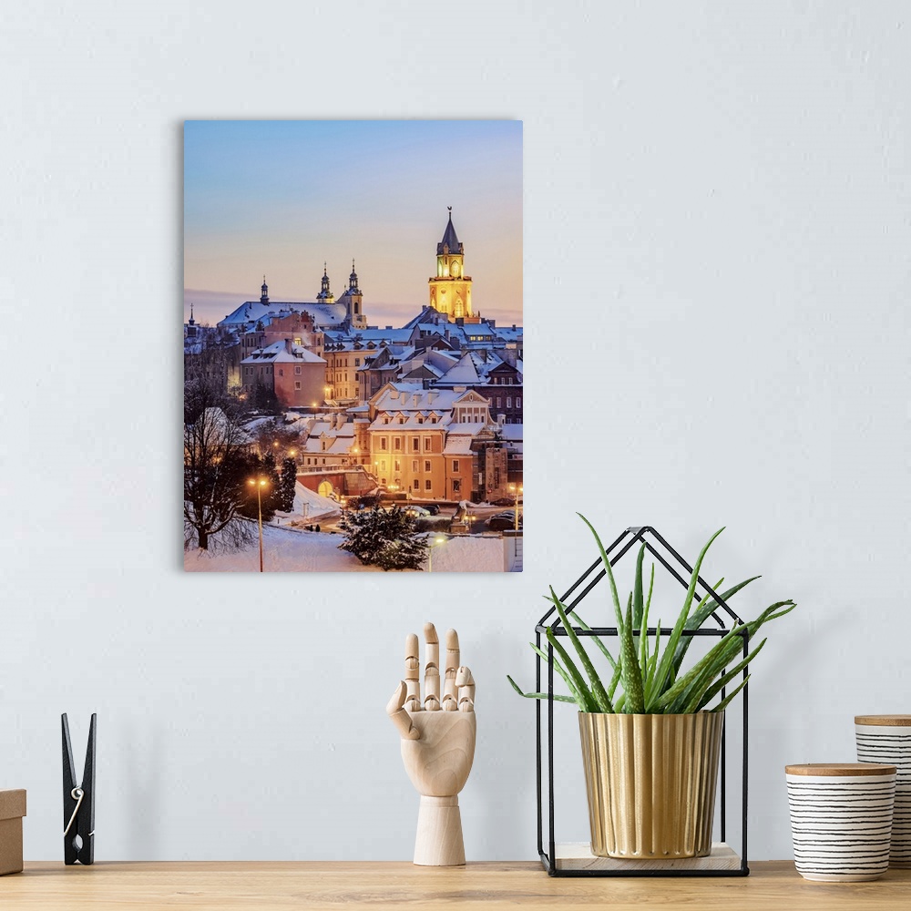 A bohemian room featuring Old Town Skyline featuring St John the Baptist Cathedral and Trinitarian Tower at dusk, winter, L...