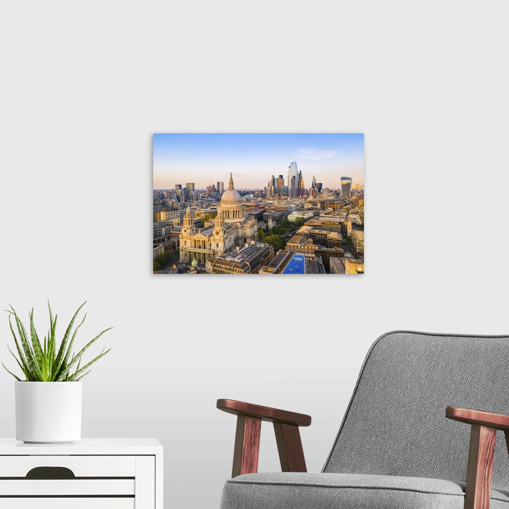 A modern room featuring St. Pauls Cathedral and city of London, bathing in the afternoon light, London, England, UK