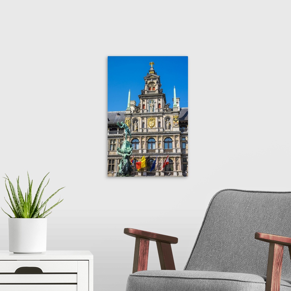 A modern room featuring Belgium, Flanders, Antwerp (Antwerpen). Stadhuis city hall and statue of Silvius Brabo on Grote M...