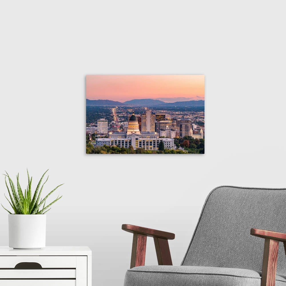 A modern room featuring State Capital building and skyline of Salt Lake City, Utah, USA.