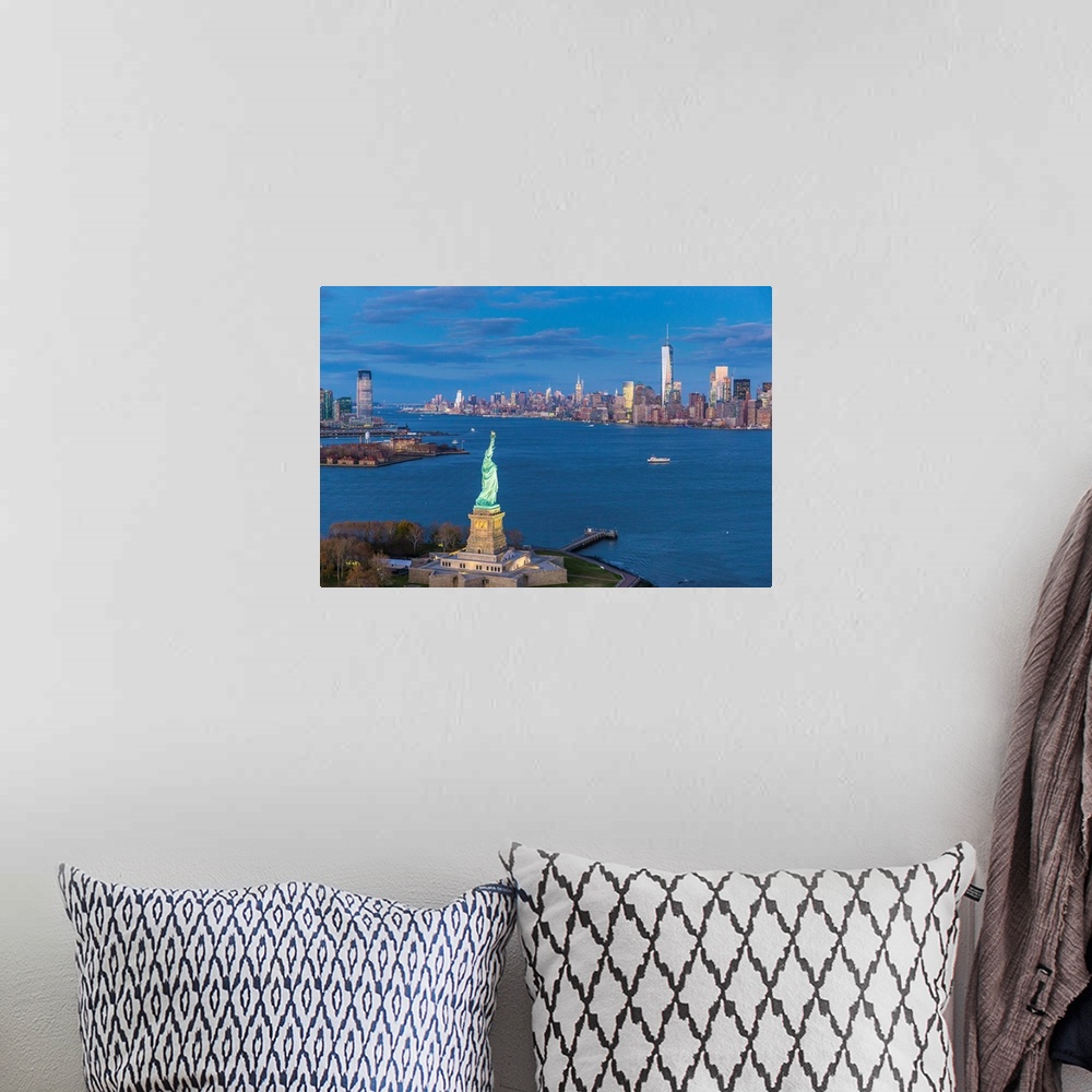 A bohemian room featuring Statue of Liberty Jersey City and Lower Manhattan, New York City, New York, USA.