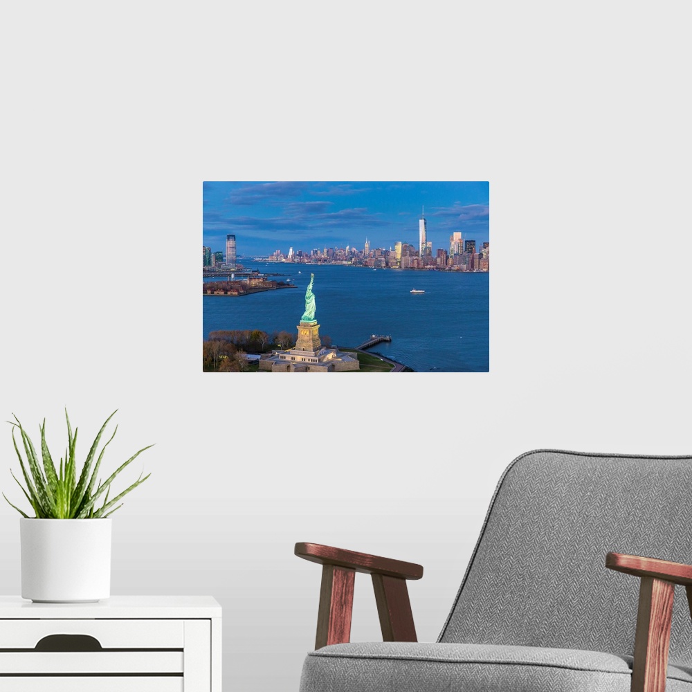 A modern room featuring Statue of Liberty Jersey City and Lower Manhattan, New York City, New York, USA.