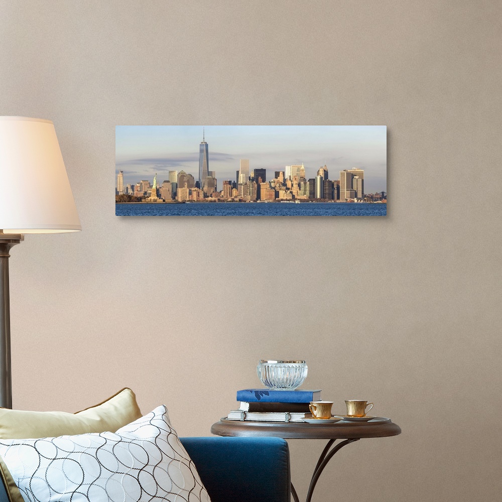 A traditional room featuring Statue of Liberty, One World Trade Center and Downtown Manhattan across the Hudson River, New Yor...