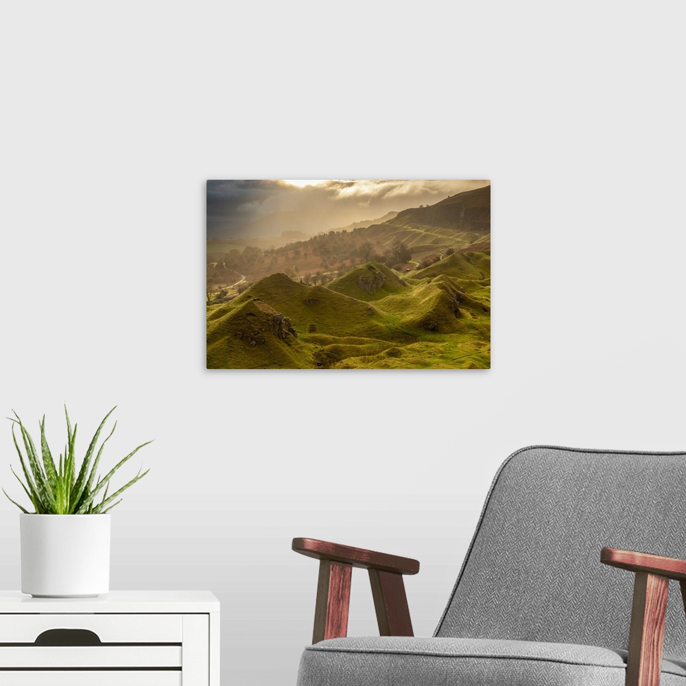 A modern room featuring Atmospheric sunrise above Llangattock Escarpment in the Brecon Beacons National Park, Powys, Wale...