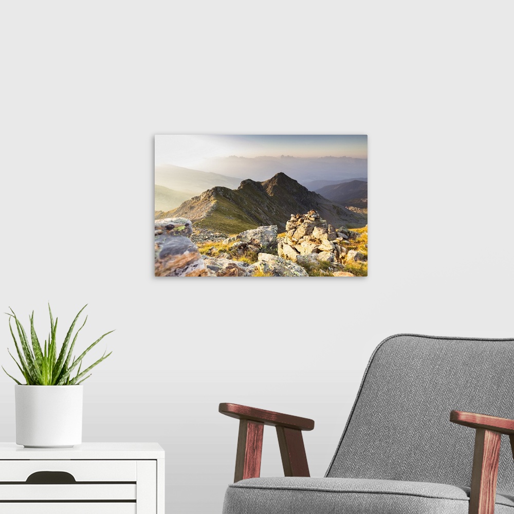A modern room featuring An emotional sunrise from the peaks of the Sarner Alps, Bolzano province, South Tyrol, Trentino A...