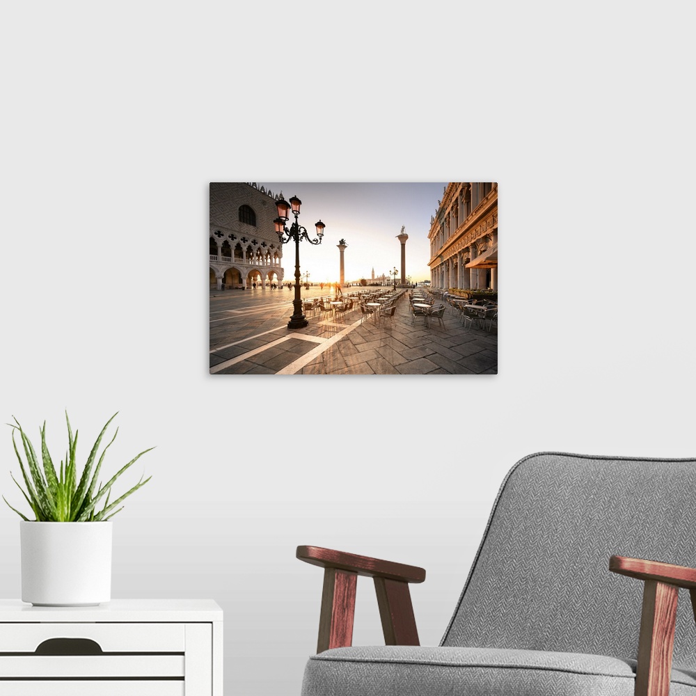 A modern room featuring Sunrise in San Marco Square, with San Giorgio Church on the background. Venice, Veneto, Italy.