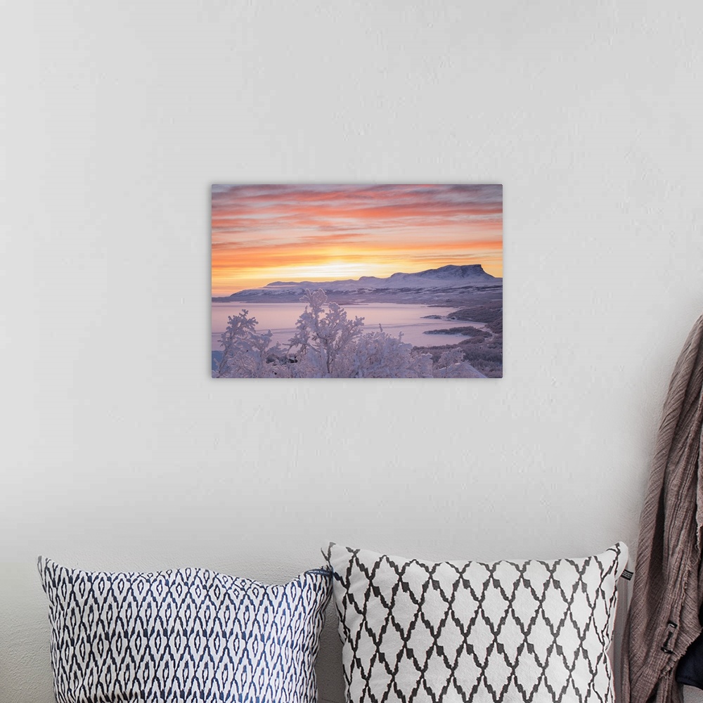 A bohemian room featuring Sunrise with burning sky, Abisko, Kiruna, Sweden, Europe