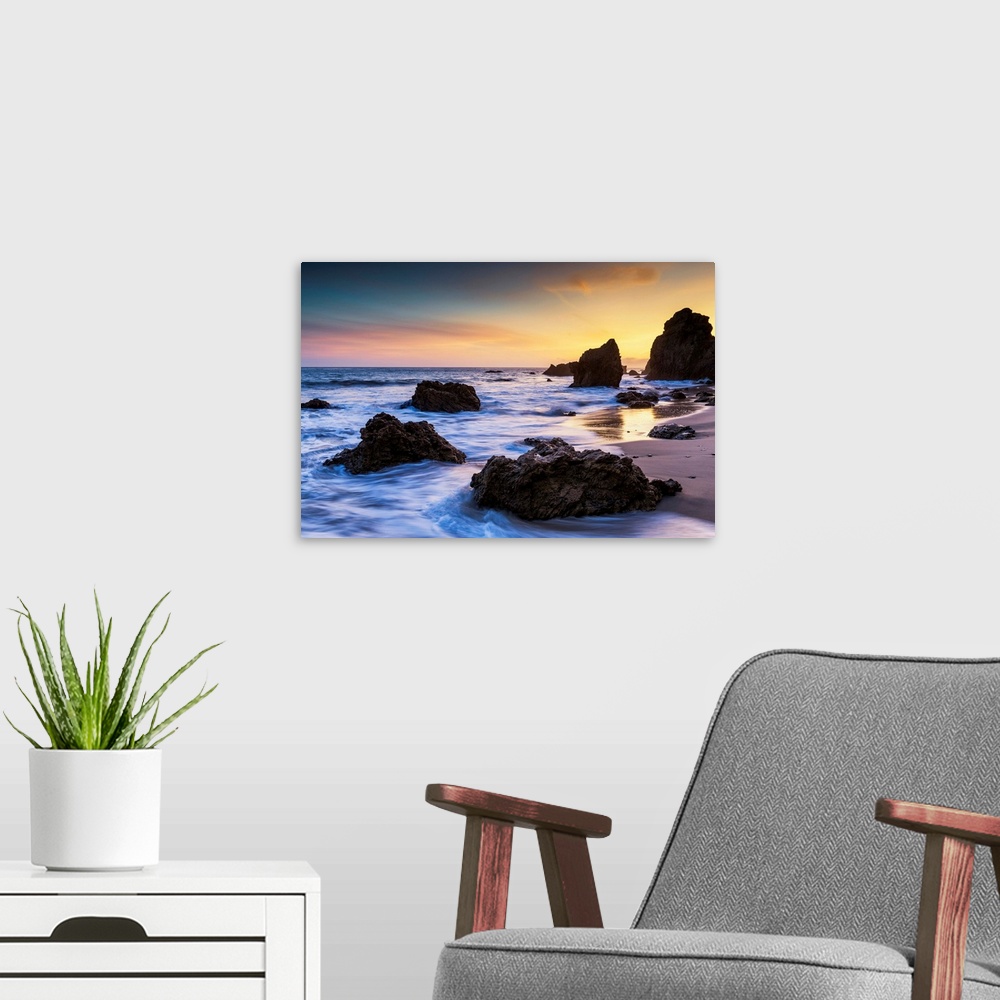 A modern room featuring Sunset At El Matador Beach, California, USA
