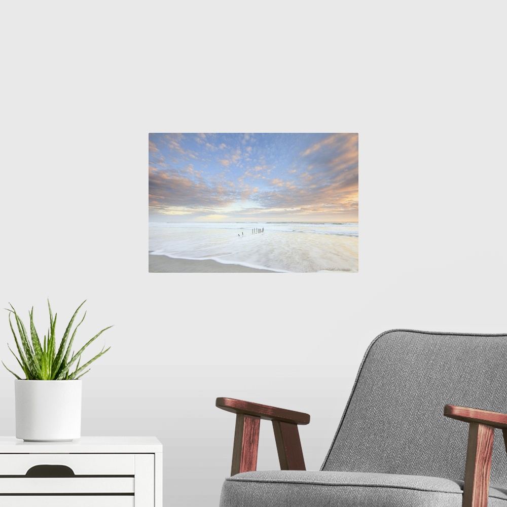 A modern room featuring Sunset at St Clair Beach, Dunedin, New Zealand