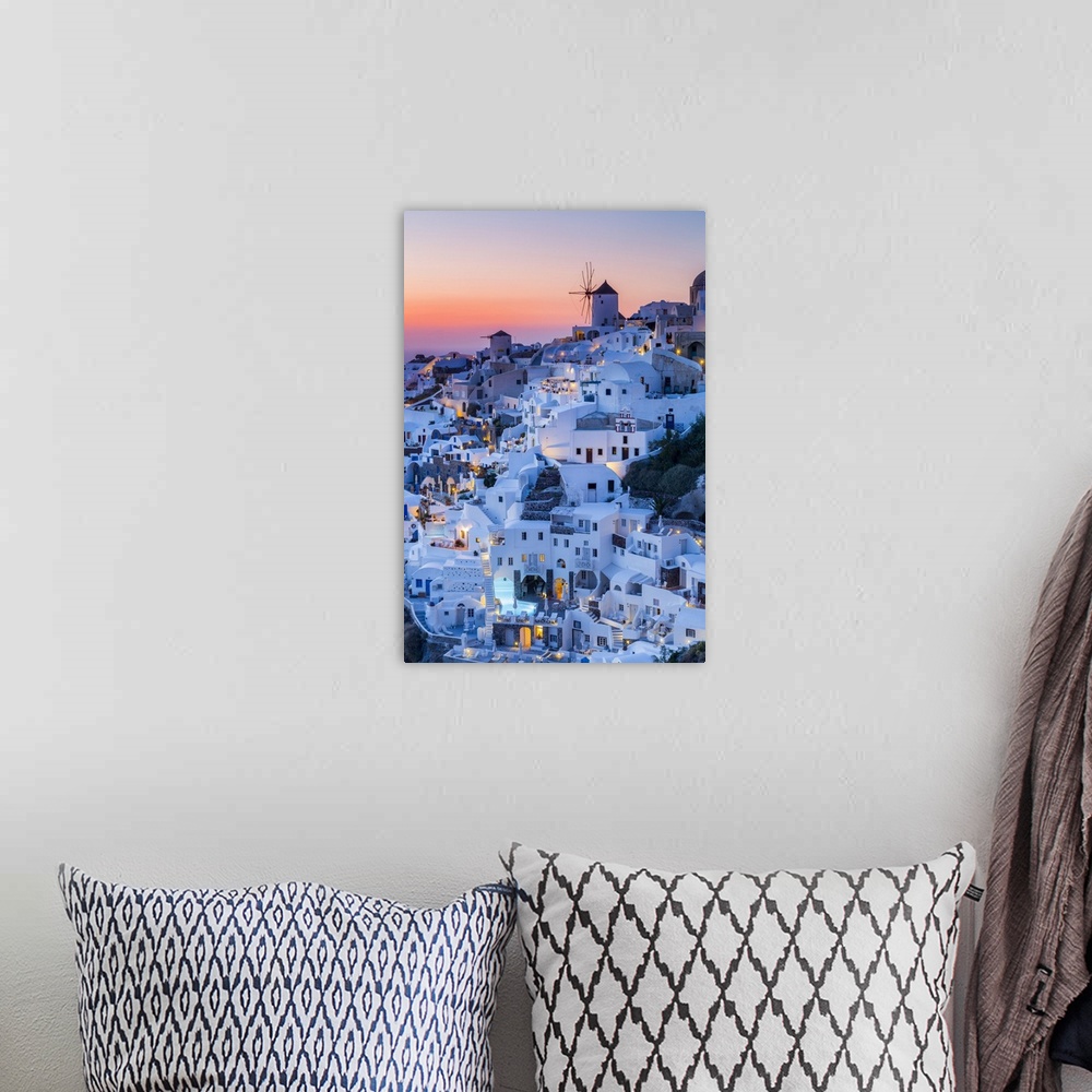 A bohemian room featuring Sunset at the village of Oia in Santorini, Cyclades Islands, Greece.