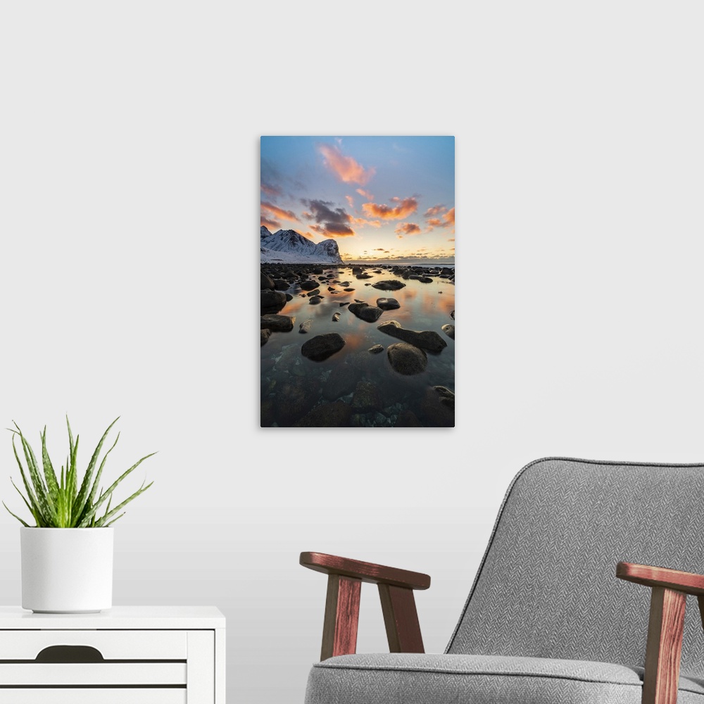 A modern room featuring Sunset at Unstad Beach in winter. Vestvagoy municipality, Nordland county, Northern Norway, Norway.