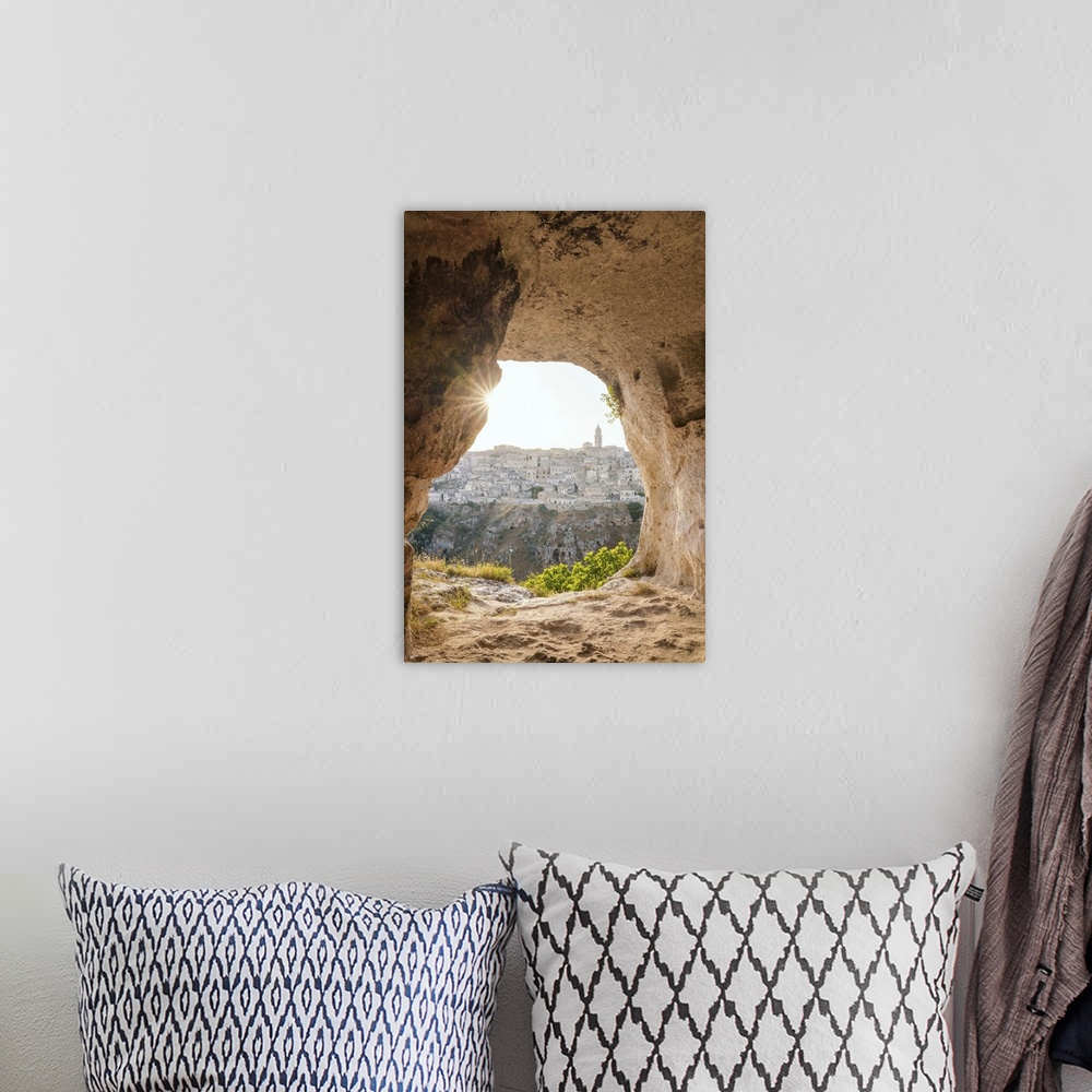 A bohemian room featuring Sunset from a grotto cave in La Murgia Belvedere, Matera, Basilicata, Italy. Unesco site and Euro...