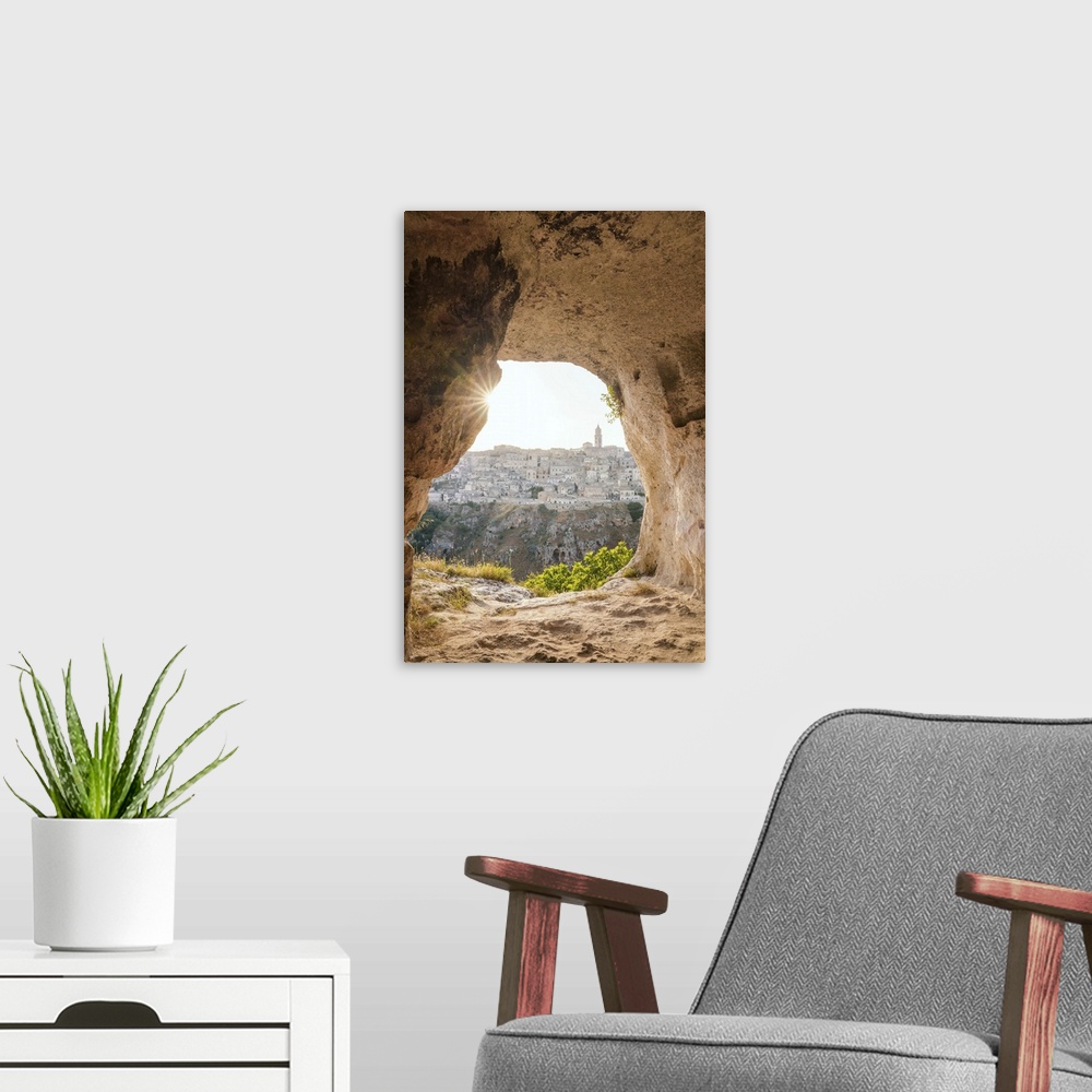 A modern room featuring Sunset from a grotto cave in La Murgia Belvedere, Matera, Basilicata, Italy. Unesco site and Euro...