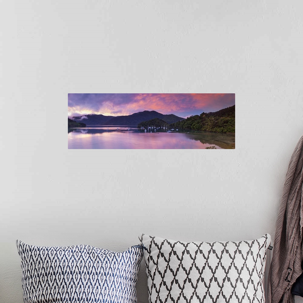 A bohemian room featuring Sunset illuminates the picturesque Ngakuta Bay, Queen Charlotte Sound, Marlborough Sounds, South ...