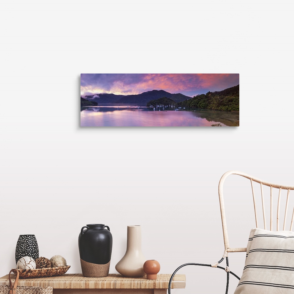 A farmhouse room featuring Sunset illuminates the picturesque Ngakuta Bay, Queen Charlotte Sound, Marlborough Sounds, South ...