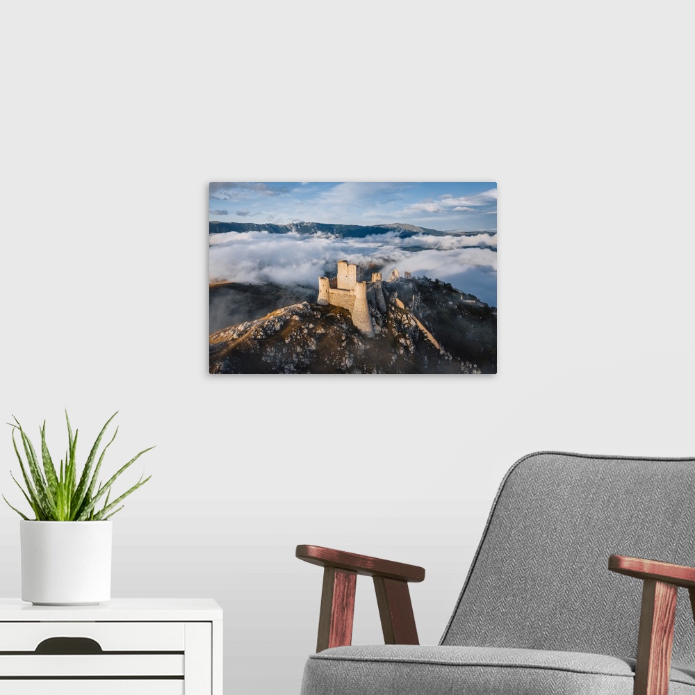 A modern room featuring Sunset in Rocca Calascio, an ancient building on the top of a mountain, Gran Sasso National Park,...