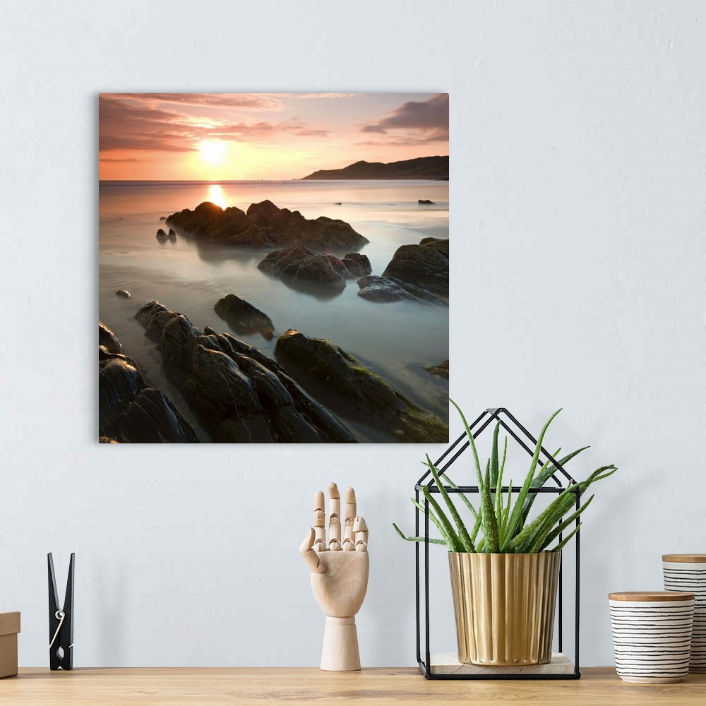 A bohemian room featuring Sunset on Barricane Beach, Woolacombe, Devon, England. Summer