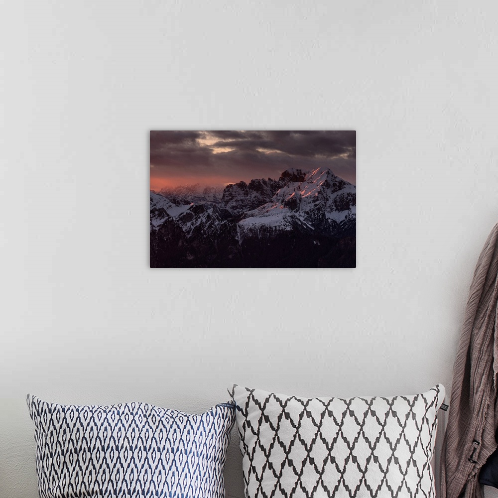 A bohemian room featuring Sunset on the top of Dolada Mount, in Alpago mountain range, Italy