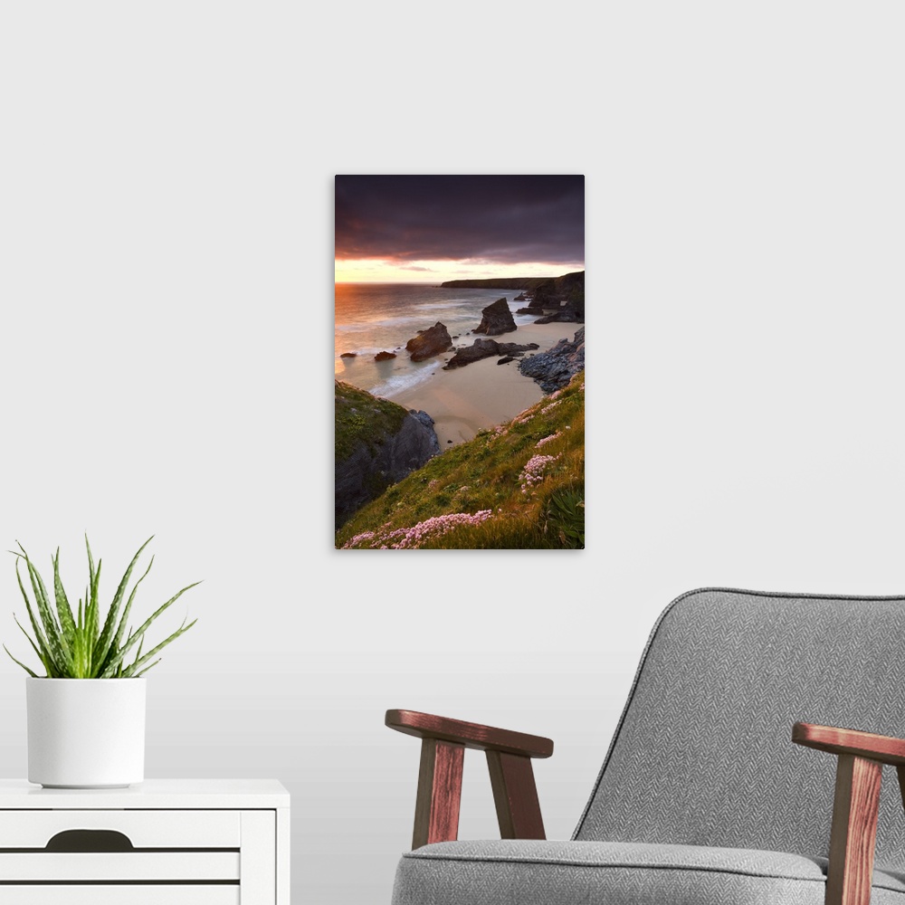 A modern room featuring Sunset over Bedruthan Steps, North Cornwall, England. Spring, May, 2009.