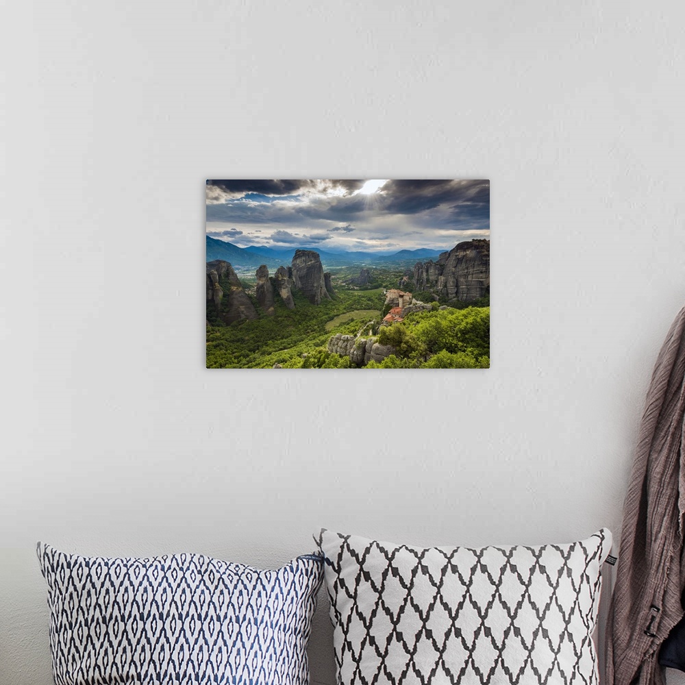 A bohemian room featuring Sunset view over Monastery of Moni Agias Varvaras Roussanou and the spectacular massive rocky pin...