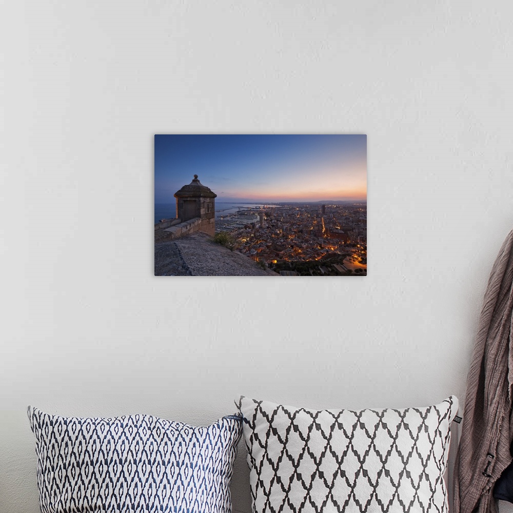 A bohemian room featuring Sunset view over the cityscape of Alicante looking towards the lookout tower and Port of Alicante...