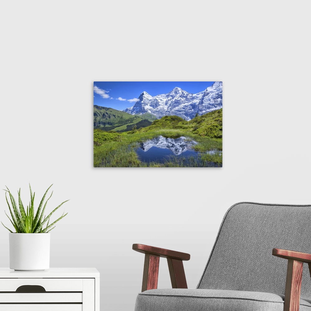 A modern room featuring Europe, Switzerland, Bern, Bernese Oberland, Reflection in pond with eiger.