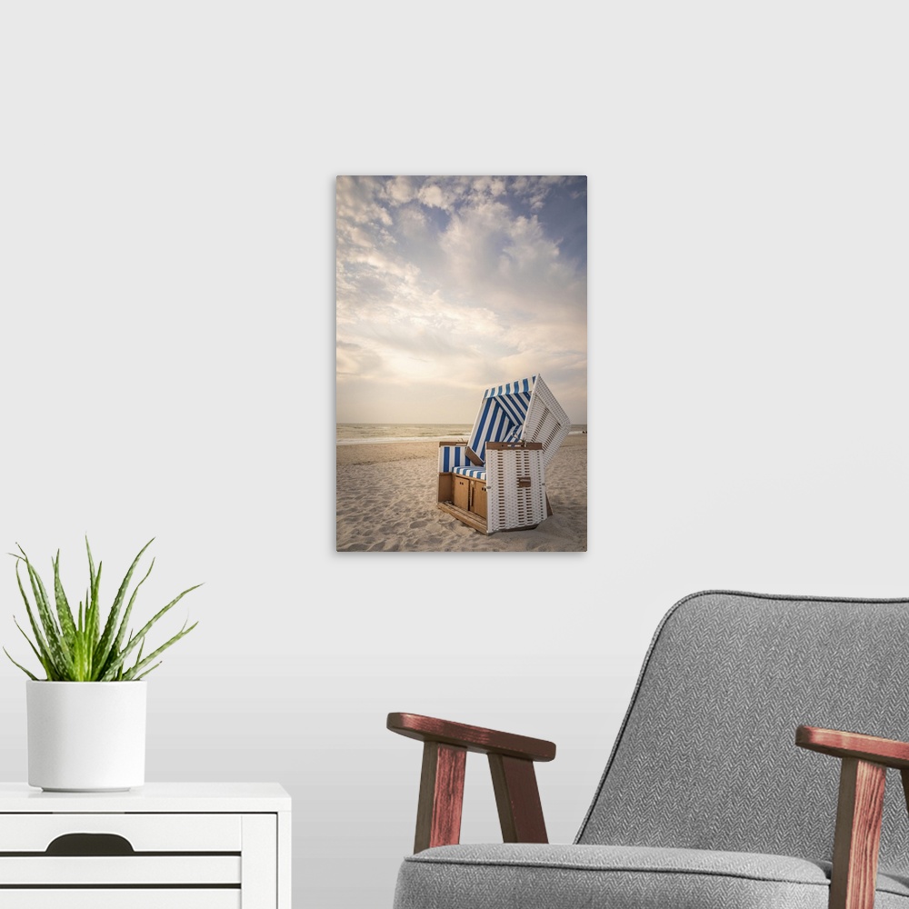 A modern room featuring Sylt beach chair in the soft evening light, Kampen, Sylt, Schleswig-Holstein, Germany.