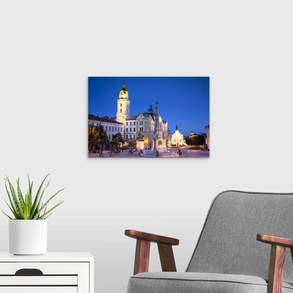 A modern room featuring Szechenyi Square at dusk, Pecs, Southern Transdanubia, Hungary