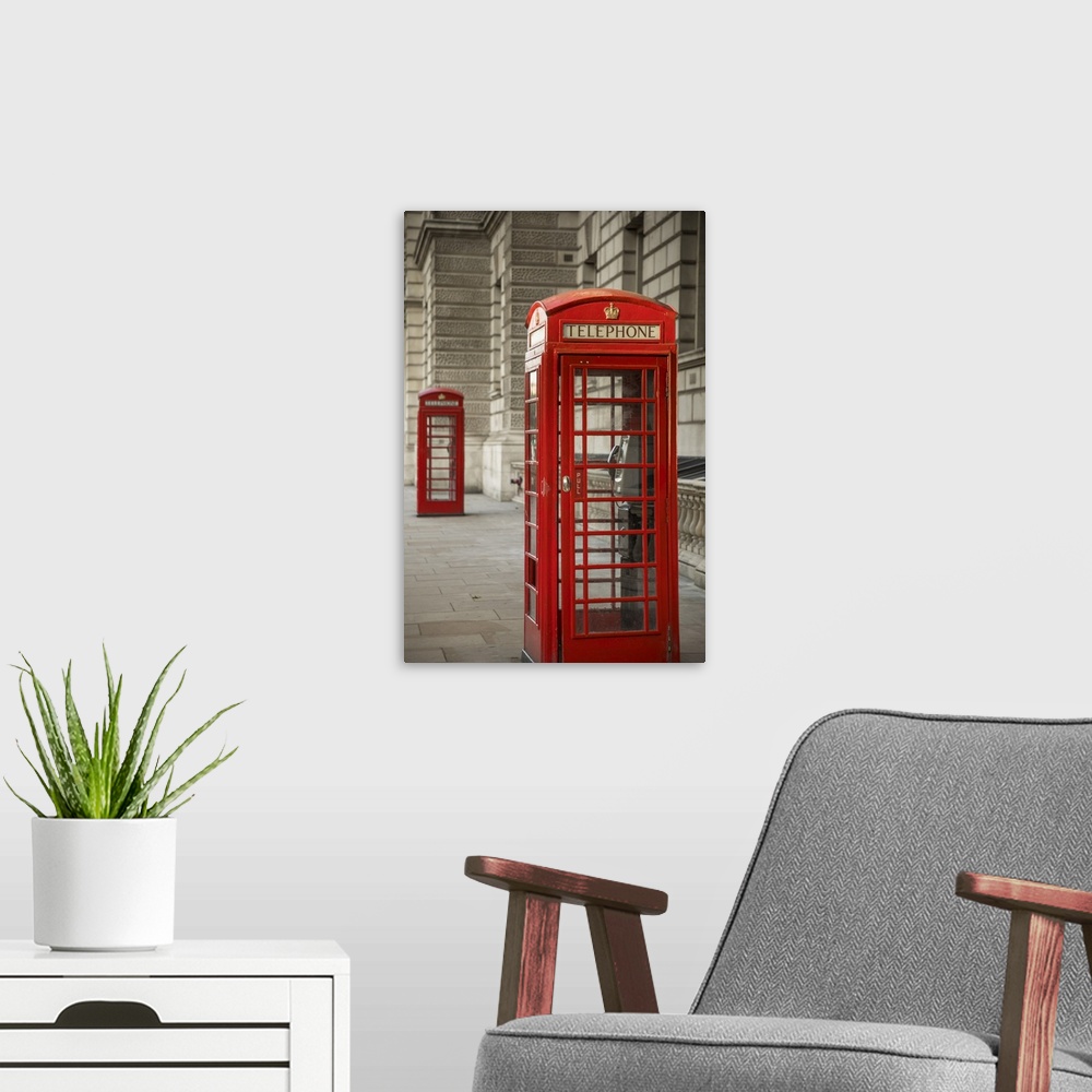 A modern room featuring Telephone boxes, Whitehall, London, England, UK