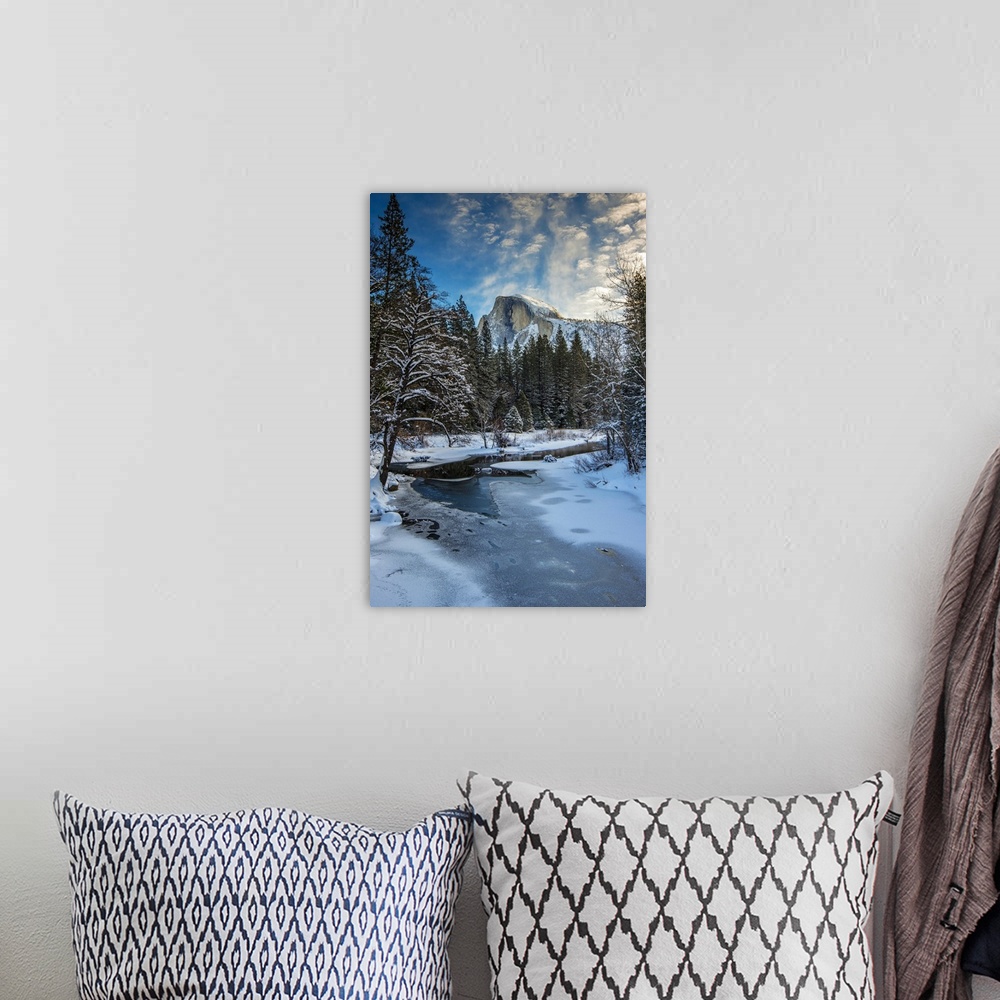 A bohemian room featuring Winter view over icy Tenaya creek with Half Dome mountain behind, Yosemite National Park, Califor...