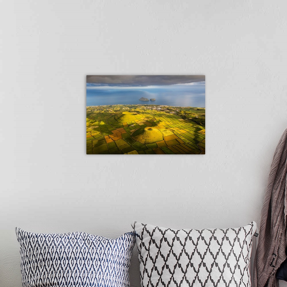 A bohemian room featuring Terceira island, Azores, Portugal, Craters and pasture fields.
