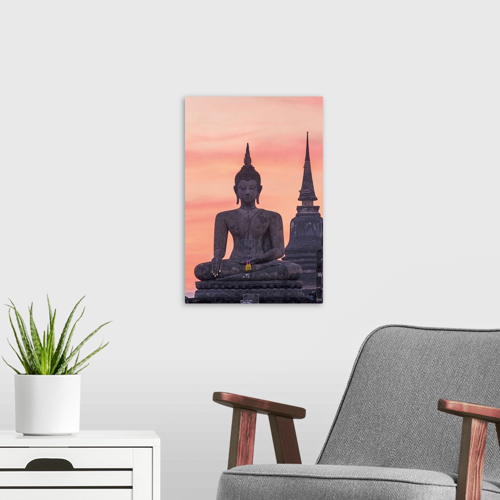 A modern room featuring Thailand, Sukhothai Historical Park. Wat Mahathat temple at sunset