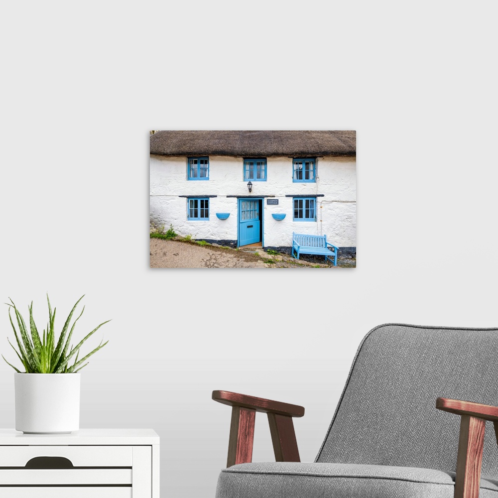 A modern room featuring Thatched cottage, cadgwith, cornwall, England.