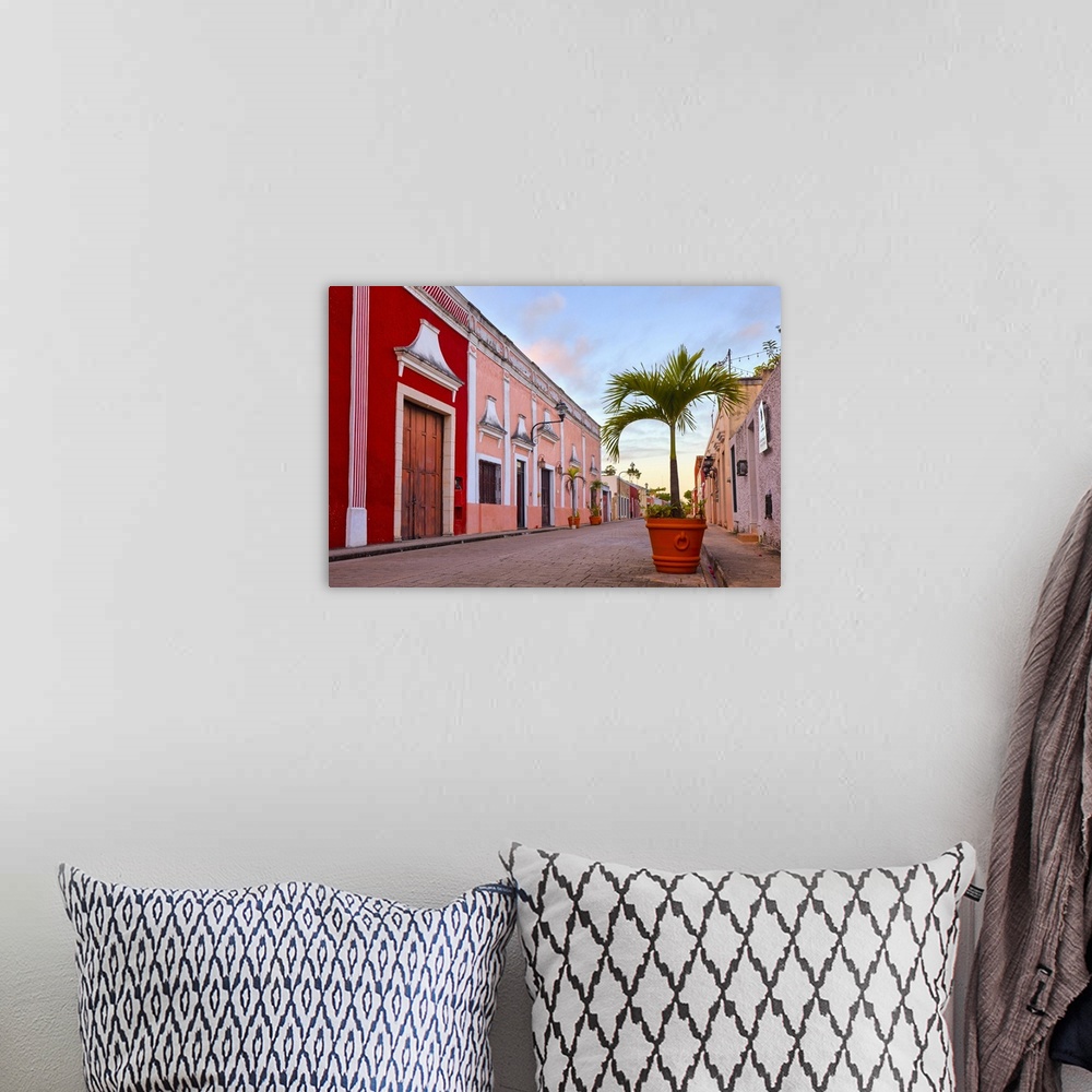 A bohemian room featuring The Calzada de los Frailes street at sunrise, Valladolid, Yucatan, Mexico.