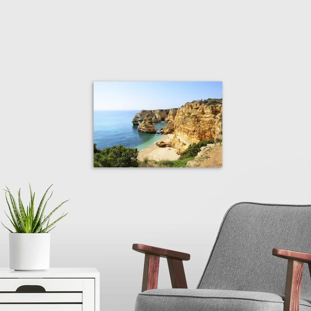 A modern room featuring The coastal rock formations at Marinha beach (Praia da Marinha). Algarve, Portugal.